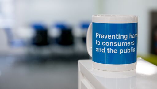Image of a mug with the words prevent harm to customers and the public printed on it